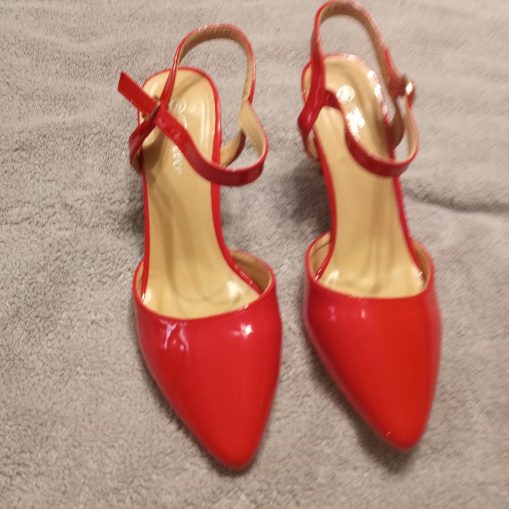 Red closed toe patten leather heels